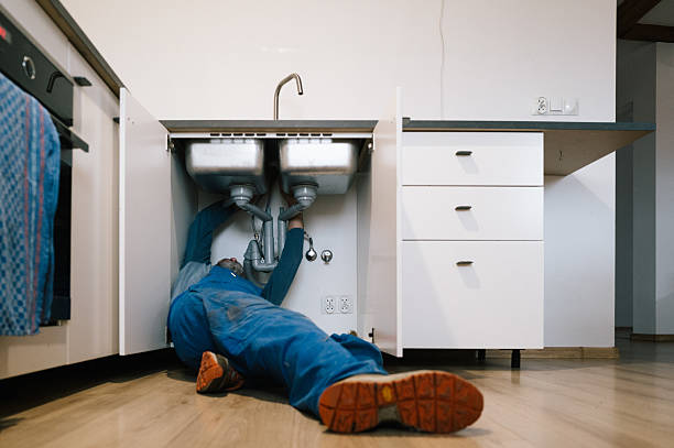 Professional Drain Cleaning technician working in Leverett, MA